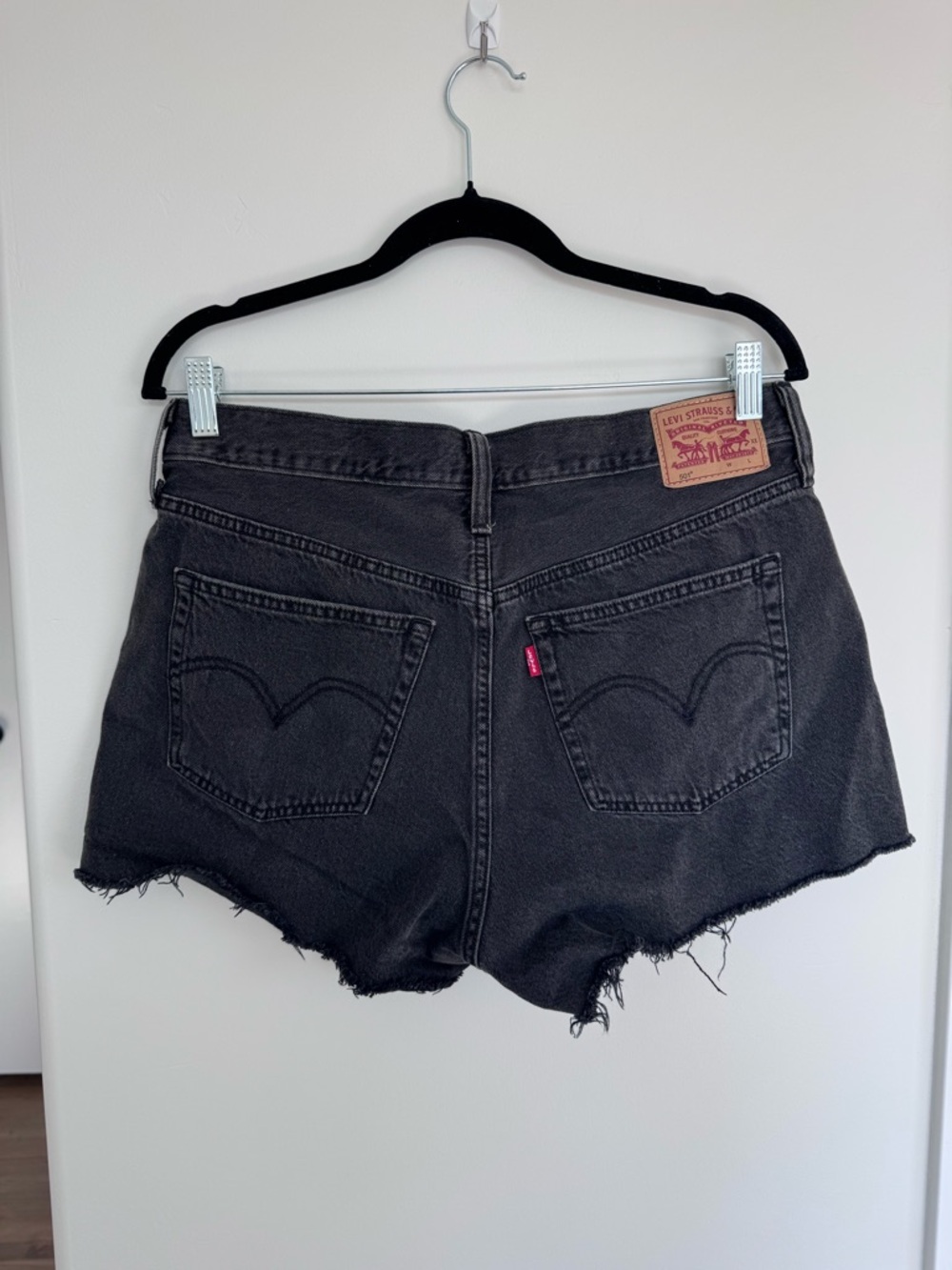 Levi's Washed Black High-Rise Cutoff Jean Shorts